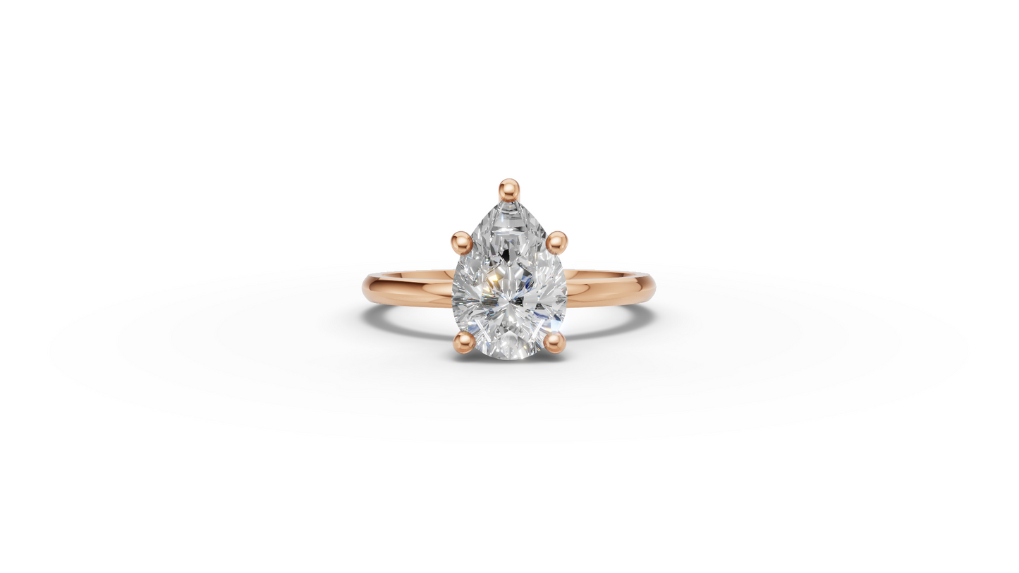 Pear Solitaire Ring
