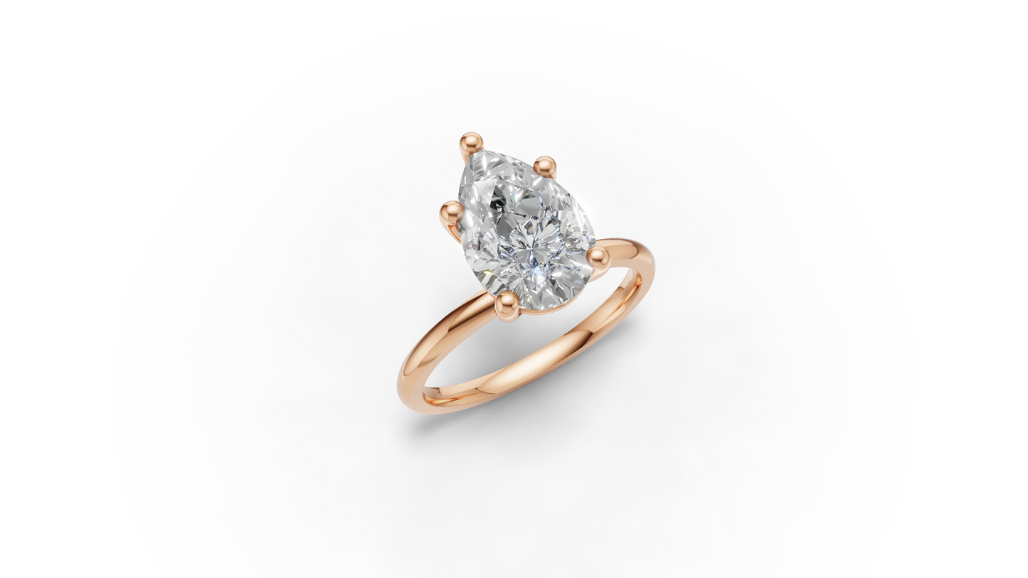 Pear Solitaire Ring